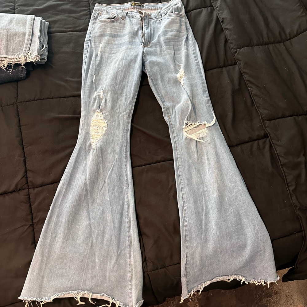 Ripped Bell Bottom Jeans